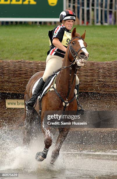 Zara Phillips in action at the water jump on her horse Ardfield Magic Star on the third day of the Badminton Horse Trials on May 3, 2008 in...