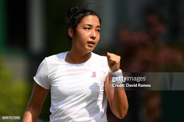 Zarina Diyas of Kazakhstan reacts during the Ladies Singles second round match against Arina Rodionova of Australia on day four of the Wimbledon Lawn...