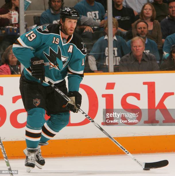 Joe Thornton of the San Jose Sharks skates on ice with the puck during game two of the 2008 NHL Stanley Cup Playoffs conference quarter-final series...
