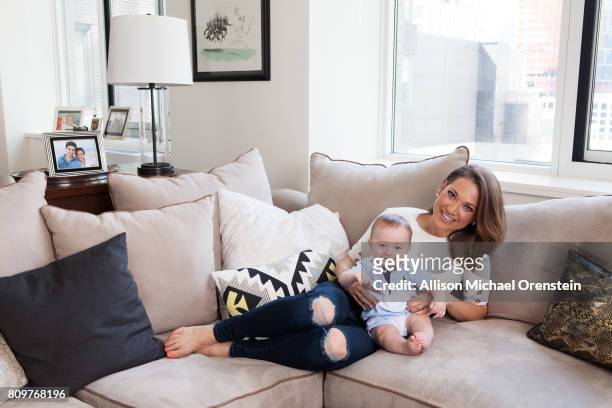News anchor Ginger Zee and son Adrian Benjamin are photographed for People Magazine on June 6, 2016 in New York City. PUBLISHED IMAGE.