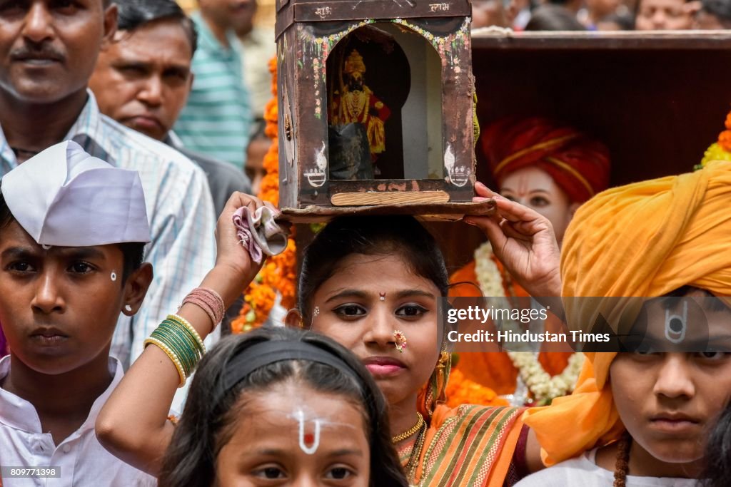 Devotees Participate In A Wari Procession On The Occasion Of Ashadhi Ekadashi