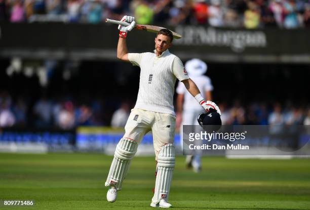 Joe Root of England celebrates reaching his century during day one of the 1st Investec Test Match between England and South Africa at Lord's Cricket...