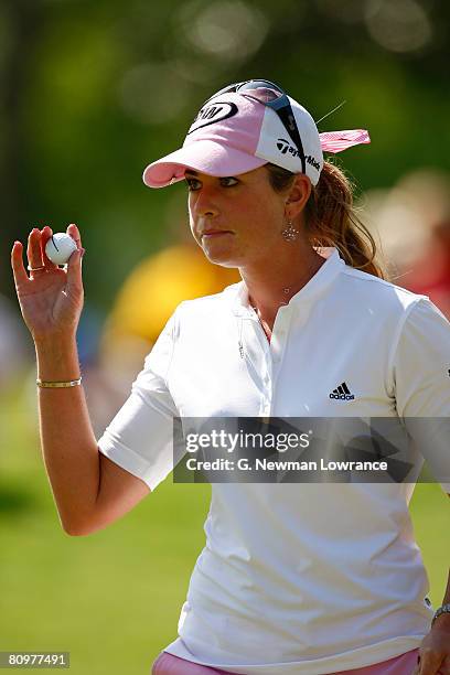 Paula Creamer acknowledges the crowd after making a putt on the 18th hole during the third round of the SemGroup Championship presented by John Q....