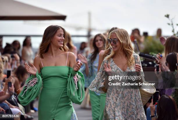 Designers Gelena Roizen and Lana Mueller acknowledge the applause of the audience the Lana Mueller show during the Mercedes-Benz Fashion Week Berlin...