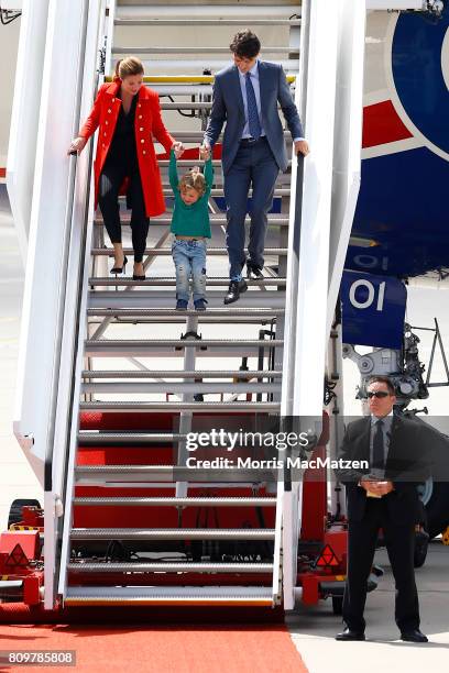 Prime Minister of Canada Justin Trudeau with first lady Sophie Trudeau and their youngest son Hadrien arrive at Hamburg Airport for the Hamburg G20...