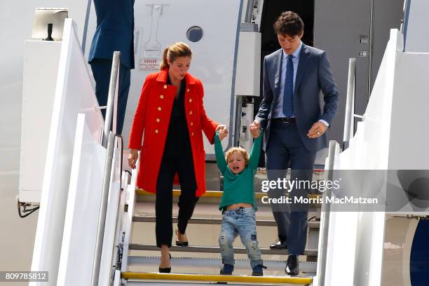 Prime Minister of Canada Justin Trudeau with first lady Sophie Trudeau and their youngest son Hadrien arrive at Hamburg Airport for the Hamburg G20...