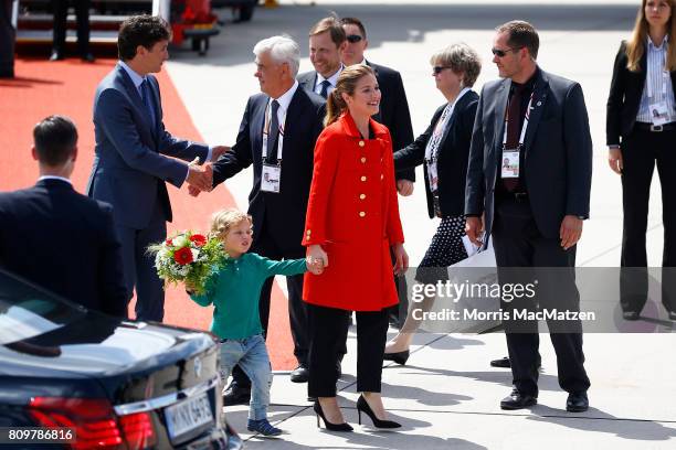 Prime Minister of Canada Justin Trudeau with first lady Sophie Trudeau and their youngest son Hadrien arrive at Hamburg Airport for the Hamburg G20...