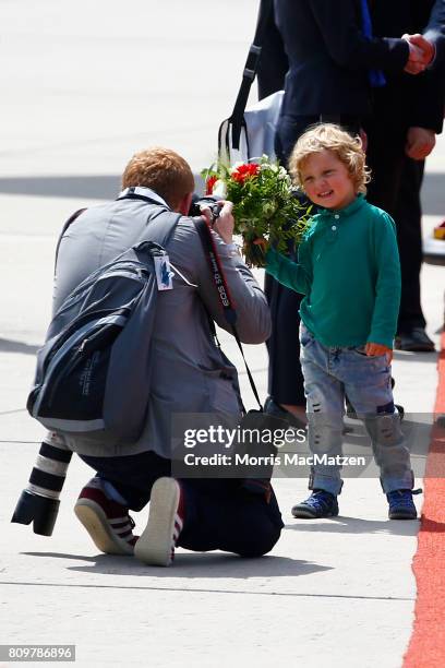 Hadrien Trudeau, son of Canadian Prime Minister Justin Trudeau, has his photo taken as the family arrives at Hamburg Airport for the Hamburg G20...