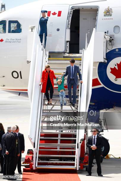 Prime Minister of Canada Justin Trudeau with first lady Sophie Trudeau and their youngest son Hadrien arrive at Hamburg Airport for the Hamburg G20...