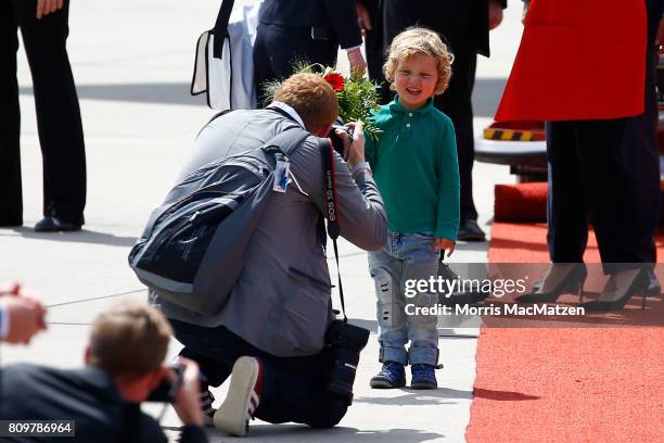Hadrien Trudeau, son of Canadian Prime Minister Justin Trudeau, has his photo taken as the family arrives at Hamburg Airport for the Hamburg G20...
