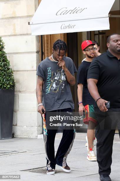 Travis Scott is seen leaving a Cartier store during Paris Fashion Week - Haute Couture Fall/Winter 2017-2018 on July 6, 2017 in Paris, France.