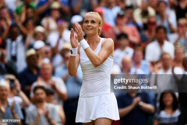 Magdalena Rybarikova of Slovakia acknowledges the crowd as she celebrates victory after the Ladies Singles second round match against Kristyna...