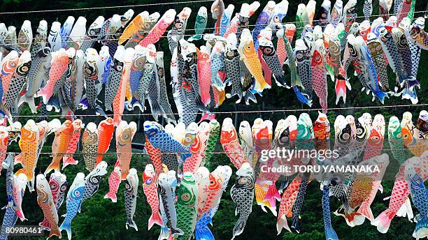 Colorful carp streamers are displayed at a park in Sagamihara, suburban Tokyo, on May 4, 2008 to celebrate Children's Day. Some 1,200 carp streamers...