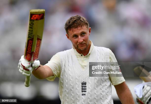 Joe Root of England acknowledges the crowd as he leaves the field at the close of play during day one of the 1st Investec Test Match between England...