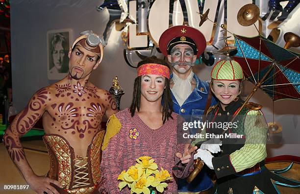 "The Beatles LOVE by Cirque du Soleil" show cast members Hassan El Hajjami, Ryan Dawes, Craig Berman and Leisha Knight, pose as they wait for...