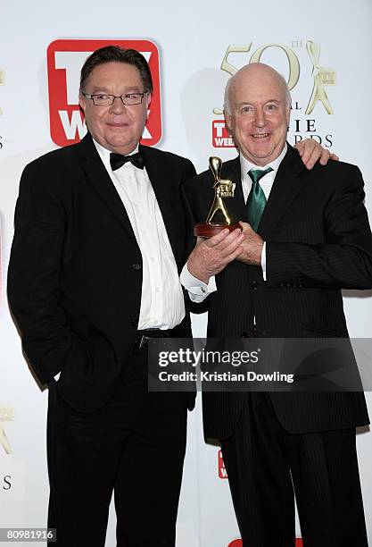 Comedians Brian Dawe and John Clarke pose with John's Lifetime Achievement Award award backstage in the Media Room at the 50th Annual TV Week Logie...