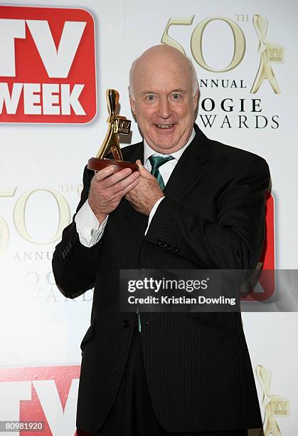 Comedian John Clarke poses with his Lifetime Achievement Award award backstage in the Media Room at the 50th Annual TV Week Logie Awards at the Crown...