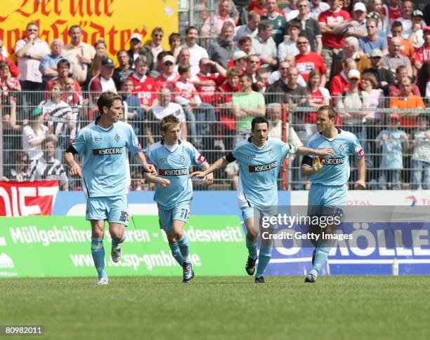 Oliver Neuville, Rob Friend, Marko Marin and Patrick Paauwe of Moenchengladbach celebrate during the Second Bundesliga match between Kickers...