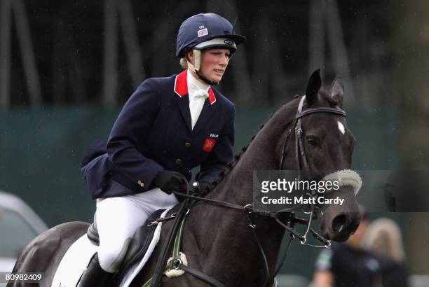 Zara Phillips rides Glenbuck as she warms up for the show jumping during the Badminton Horse Trials on May 4 2008 in Badminton, England. Reigning...