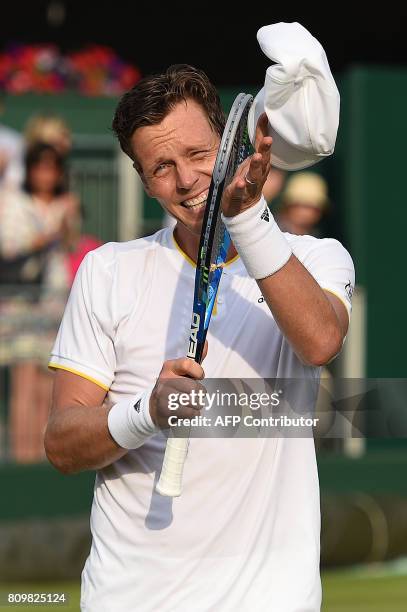 Czech Republic's Tomas Berdych reacts after winning against US player Ryan Harrison during their men's singles second round match on the fourth day...