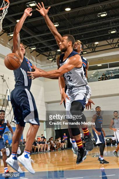 Trey McKinney-Jones of the Indiana Pacers drives to the basket and passes the ball against the Oklahoma City Thunder during the Mountain Dew Orlando...