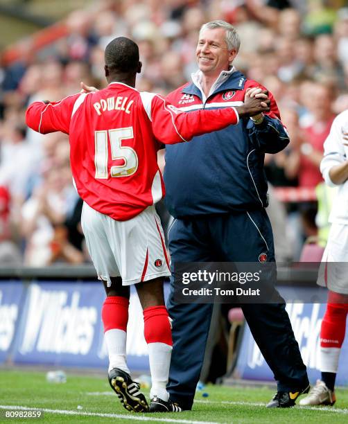 Chris Powell of Charlton Athletic celebrates scoring his sides fourth goal with the manager Alan Pardew during the Coca Cola Championship match...