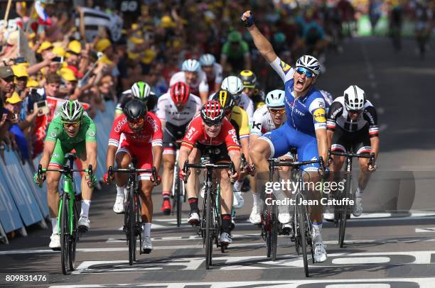 Marcel Kittel of Germany and Quick Step Floors celebrates winning, in front of Arnaud Demare of France and FDJ , Andre Greipel of Germany and Lotto...