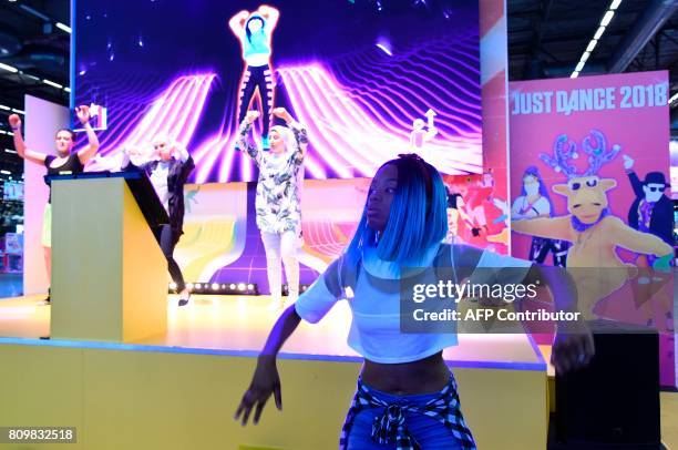 People dance during the 2017 Japan Expo exhibition on July 6, 2017 in Villepinte, near Paris. The 2017 Japan Expo, dedicated to Japanese culture and...