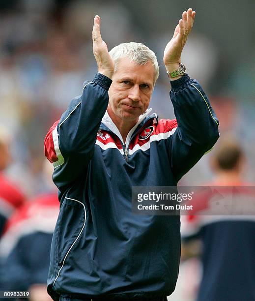 Manager of Charlton Athletic, Alan Pardew, applauds the fans after the Coca Cola Championship match between Charlton Athletic and Coventry City at...