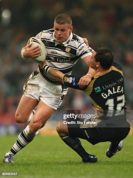 Lee Radford of Hull FC is hauled down by Ben Galea of Hull KR during the engage Super League "Millennium Magic" match between Hull FC and Hull KR at...