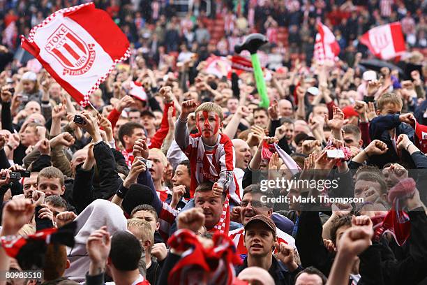 Stoke fans celebrate their promotion to next seasons Premier League after the Coca-Cola Championship match between Stoke City and Leicester City at...