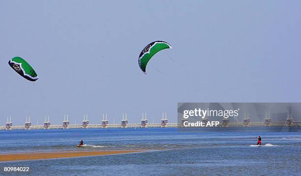 Kite surfers enjoy good weather on May 4, 2008 close to Neeltje Jans which is part of the Oosterscheldekering, the largest of the Dutch Delta works...