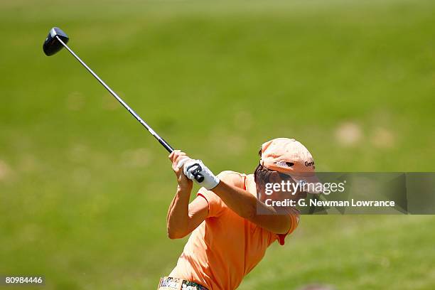 Juli Inkster tees off on the fourth hole during the final round of the SemGroup Championship presented by John Q. Hammons at Cedar Ridge Country Club...