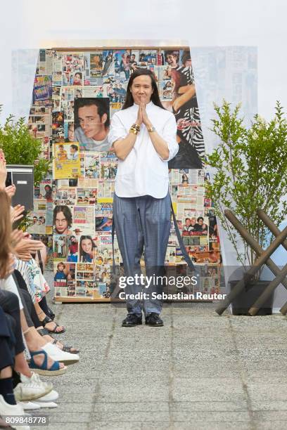 Designer William Fan is seen on the runway during the William Fan defile during 'Der Berliner Mode Salon' Spring/Summer 2018 at Kronprinzenpalais on...