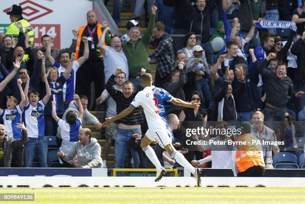 Blackburn Rovers' Martin Olsson celebrates in front of the fans after scoring the first goal of the game