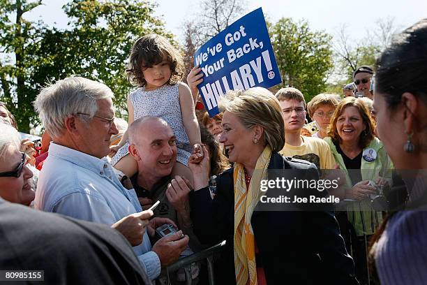 Democratic presidential hopeful Sen. Hillary Clinton greets people during a campaign event at a Hillary Clinton for President campaign office May 4,...