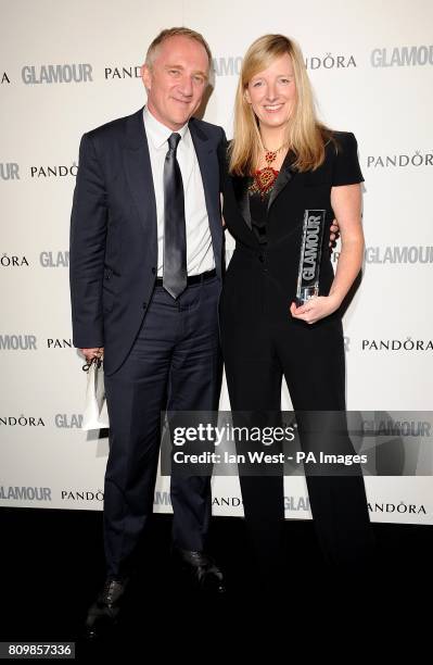 Francois Henri Pinault with winner of the Designer of the Year award Sarah Burton, at the 2011 Glamour Women of the Year Awards in Berkeley Square,...