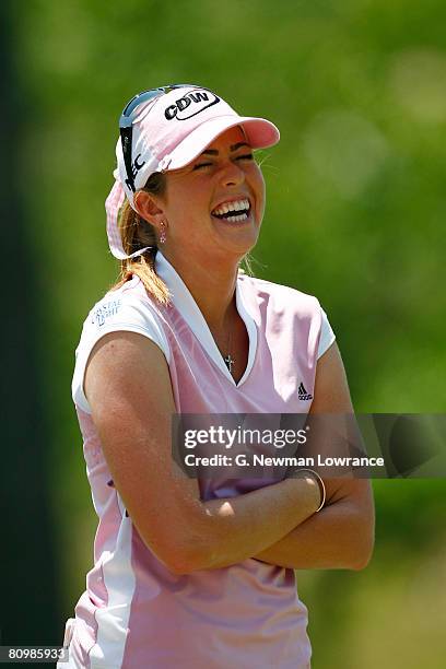 Paula Creamer smiles after making a birdy putt on the 3rd hole during the final round of the SemGroup Championship presented by John Q. Hammons on...