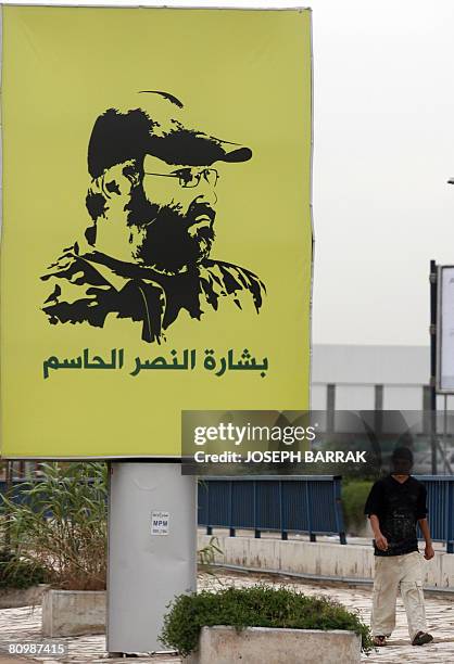 Poster of recently assassinated Hezbollah commander Imad Mughnieh is displayed at Rafiq Hariri International Airport in Beirut on March 28, 2008....