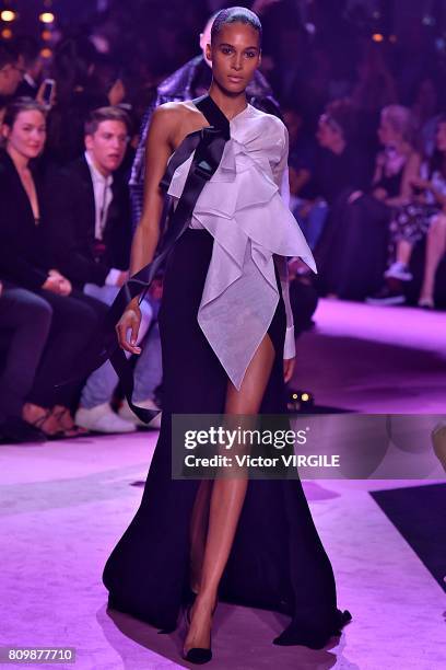 Cindy Bruna walks the runway during the Alexander Vauthier Haute Couture Fall/Winter 2017-2018 show as part of Haute Couture Paris Fashion Week on...