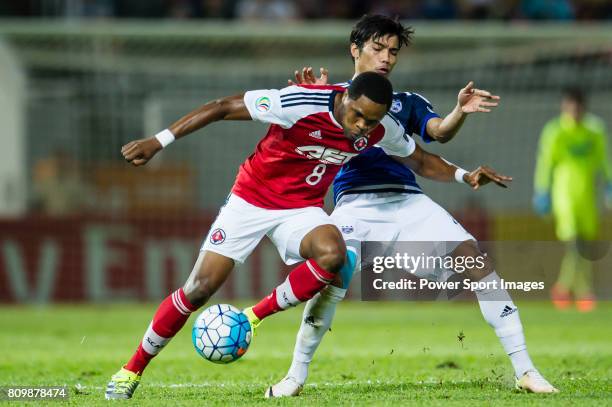 South China midfielder Mahama Awal fights for the ball with Johor Darul Ta'zim forward Mohd Azinee Bin Taib during the AFC Cup 2016 Quarter Finals...