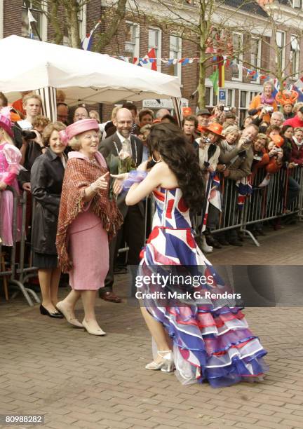 Queen Beatrix from the Dutch Royal Family dances on the streets on Queensday, April 30, 2008 in Makkum, The Netherlands.