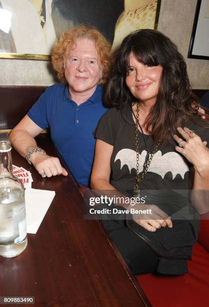 Mick Hucknall and Gabriella Wesberry attend Sticky Fingers' 28th Birthday hosted by Bill Wyman on July 6, 2017 in London, England.