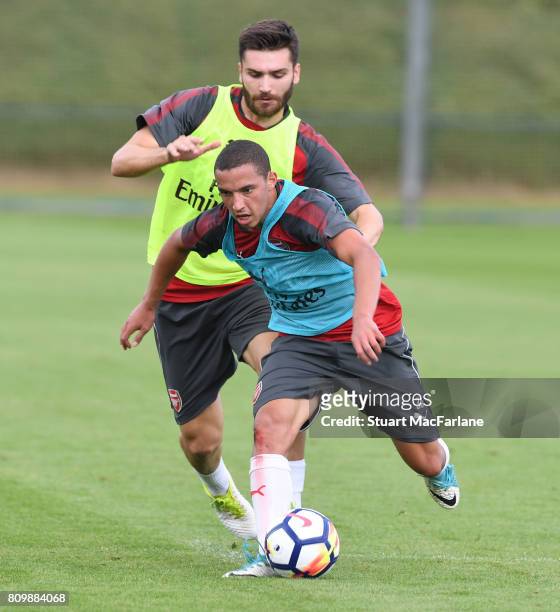 Jon Toral and Ismael Bennacer of Arsenal during a training session at London Colney on July 6, 2017 in St Albans, England.