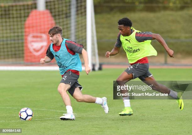 Dan Crowley and Joe Willock of Arsenal during a training session at London Colney on July 6, 2017 in St Albans, England.