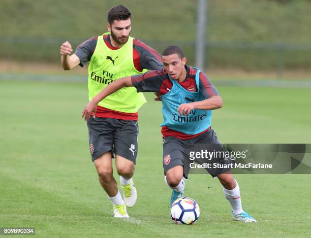 Jon Toral and Ismael Bennacer of Arsenal during a training session at London Colney on July 6, 2017 in St Albans, England.