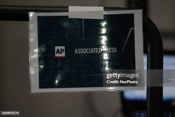 Associated Press television sign is seen at the press center in the Hamburg Messe where the 2017 G20 meeting will be held on Friday and Saturday.