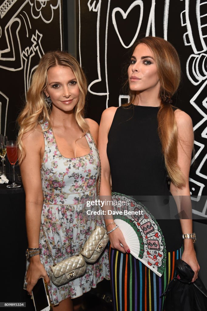 Sophie Hermann and guest attend a private view of 'One Love', the