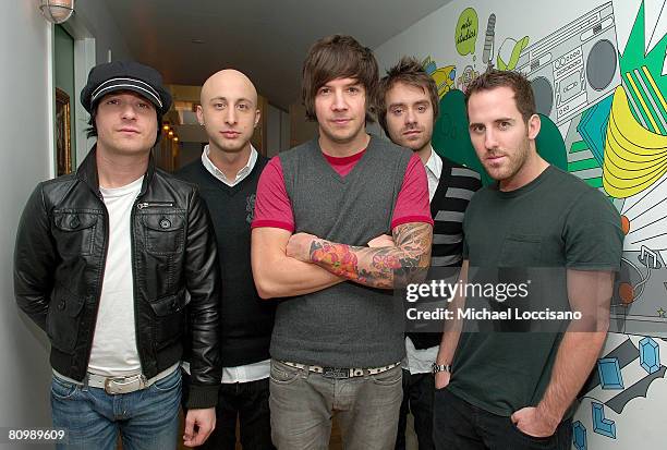 Bassist David Desrosiers, guitarist Jeff Stinco, lead singer Pierre Bouvier, guitarist Sebastien Lefebvre and drummer Chuck Comeau of Simple Plan...