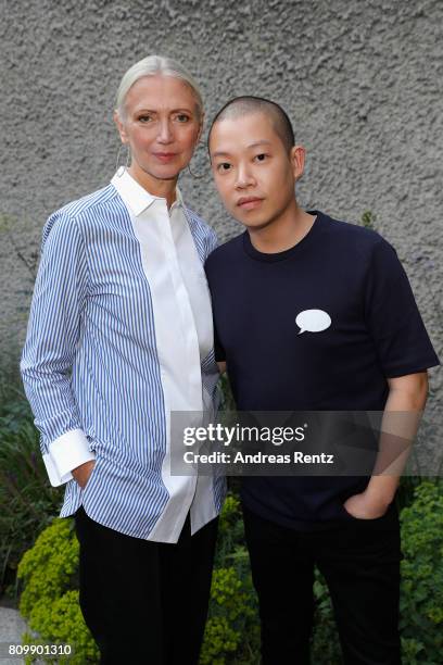 Christiane Arp and Jason Wu arrive to the Hugo Boss presentation during 'Der Berliner Mode Salon' Spring/Summer 2018 at St. Agnes Church on July 6,...